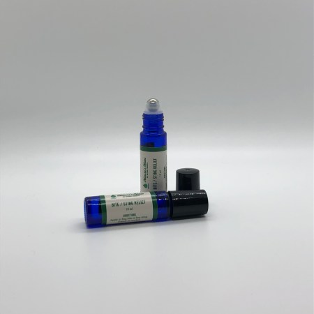 A product photo of two 10 ml cobalt blue roller bottles with Natures Notes Bite/Sting Relief roll on.