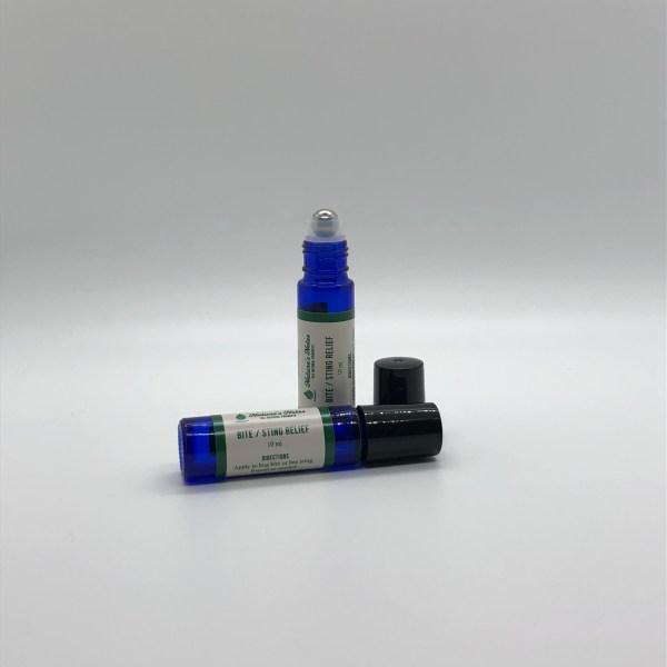 A product two 10 ml cobalt blue roller bottles with Natures Notes Bite/Sting Relief roll on.