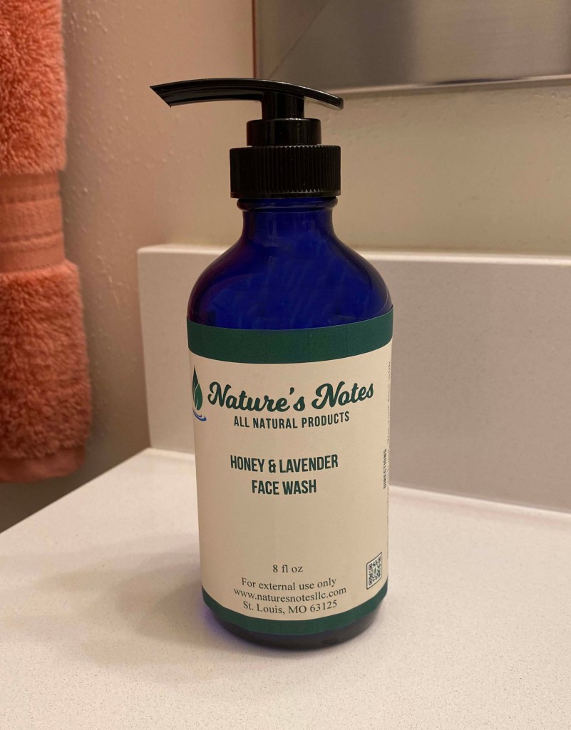 Cobalt blue 8 oz pump bottle with honey & lavender body wash.