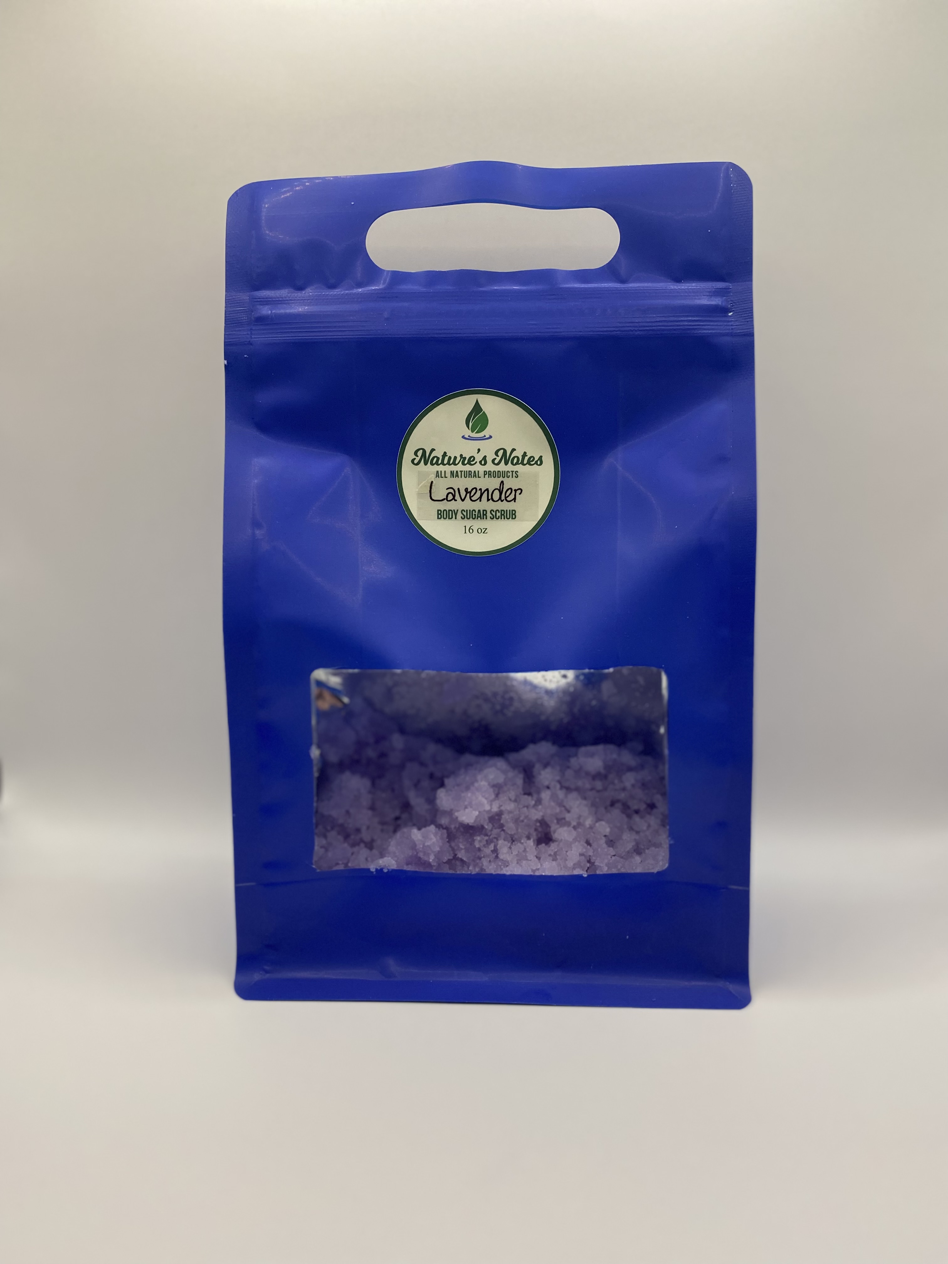 cobalt blue resealable bag with lavender sugar scrub.